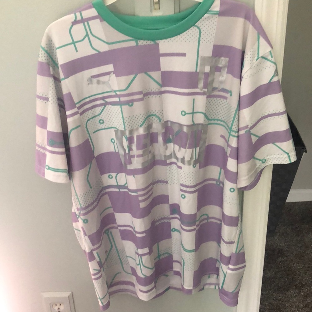 Puma dri fit soccer shirt.